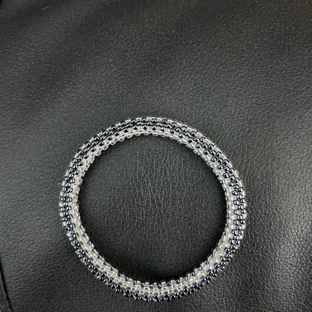 Sleek Black and Silver Spiral Bracelet